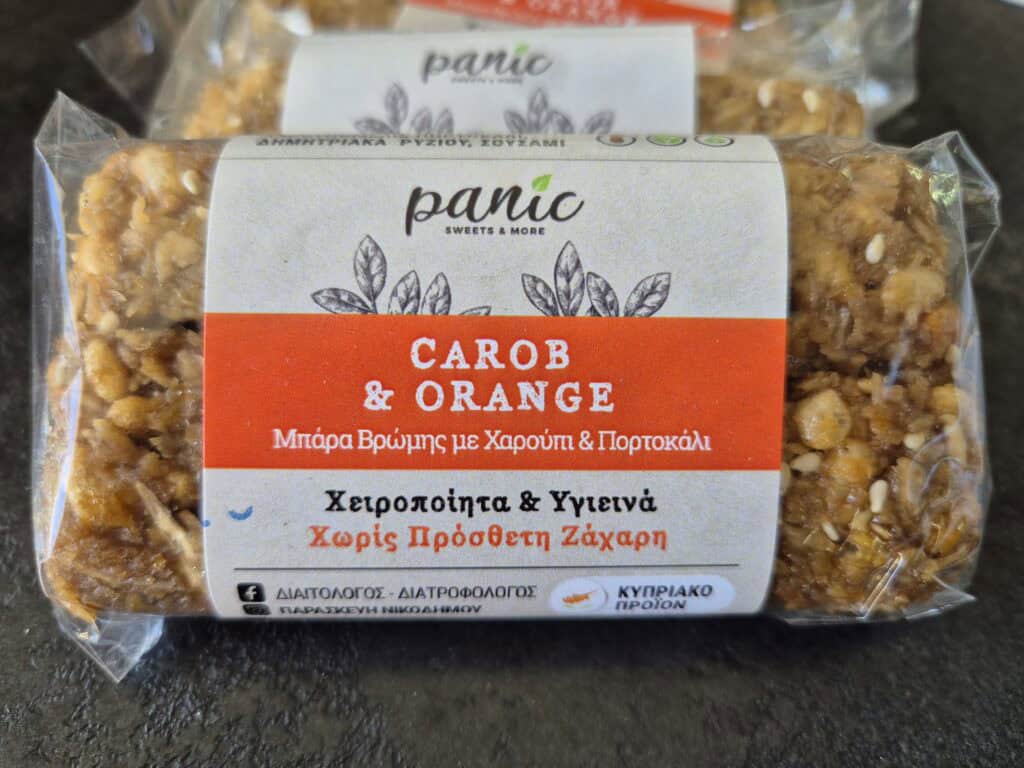 Carob & Orange Oat Bar Natural energy snack No added sugar bar High-fiber snack Antioxidant-rich treat Handmade healthy bar Gluten-free snack option (if applicable) Plant-based protein snack Whole-grain oat bar Vitamin C boost snack